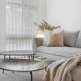 Heavy white linen cushion with the elke velvet sand cushion with duck feather cushion insert.