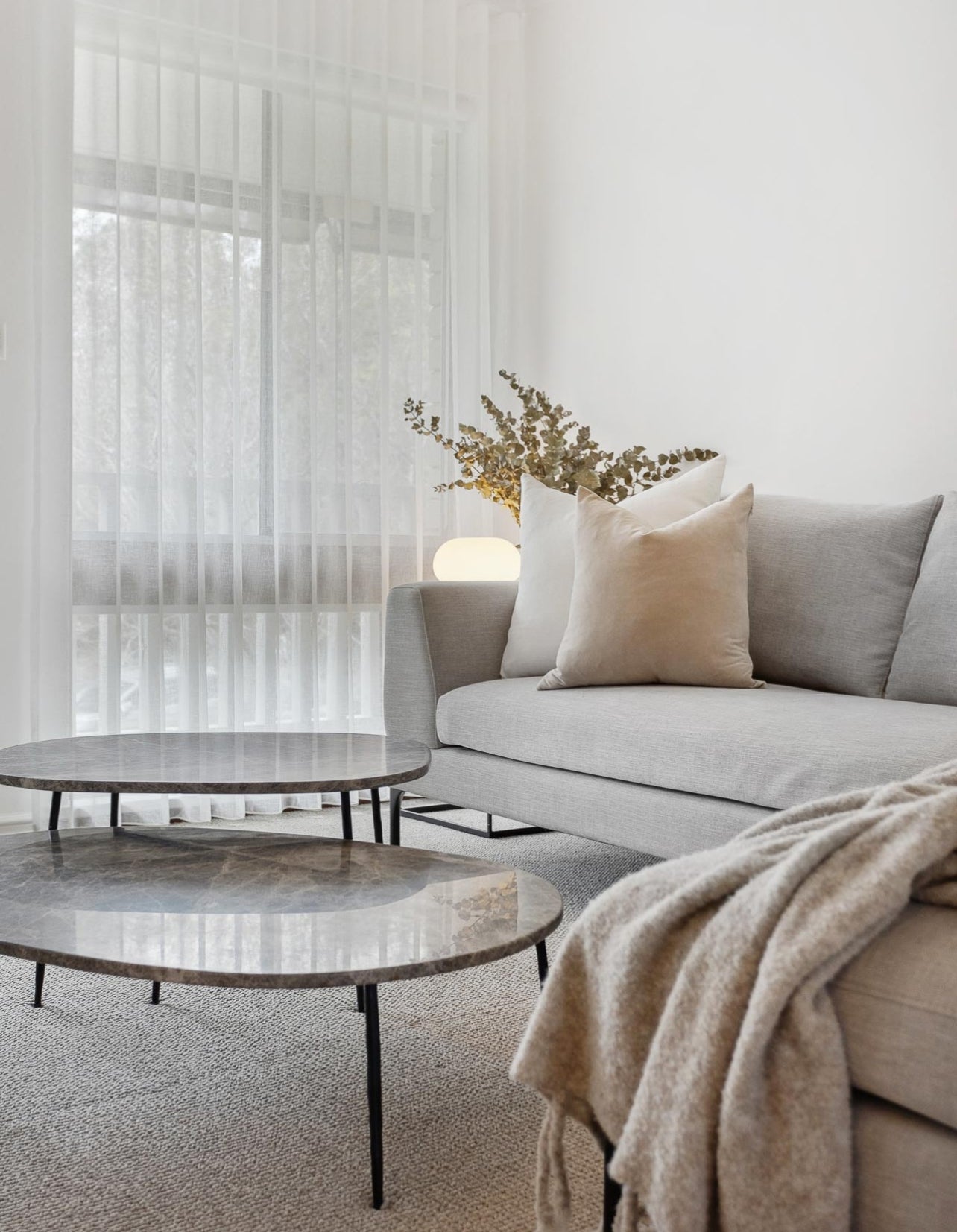 Heavy white linen cushion with the elke velvet sand cushion with duck feather cushion insert. 